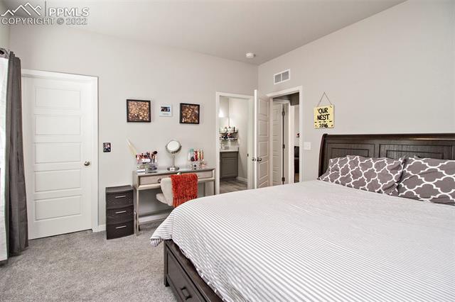9570 Timberlake Loop Colorado Springs, CO 80927 - Photo 24 of 36 Main bedroom