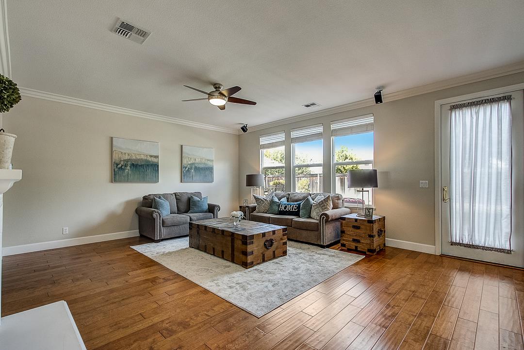 7108 Lahinch Drive Gilroy, CA 95020 - Photo 19 of 50 a living room with furniture and wooden floor
