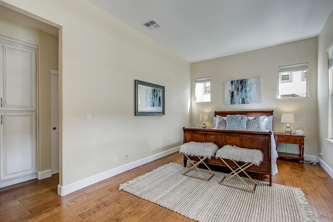 7108 Lahinch Drive Gilroy, CA 95020 - Photo 20 of 50 a bedroom with a bed and a desk