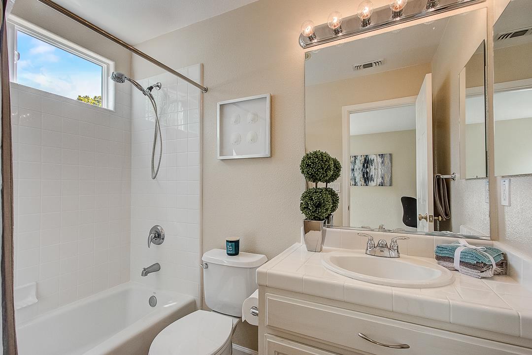 7108 Lahinch Drive Gilroy, CA 95020 - Photo 25 of 50 a bathroom with a sink toilet and shower