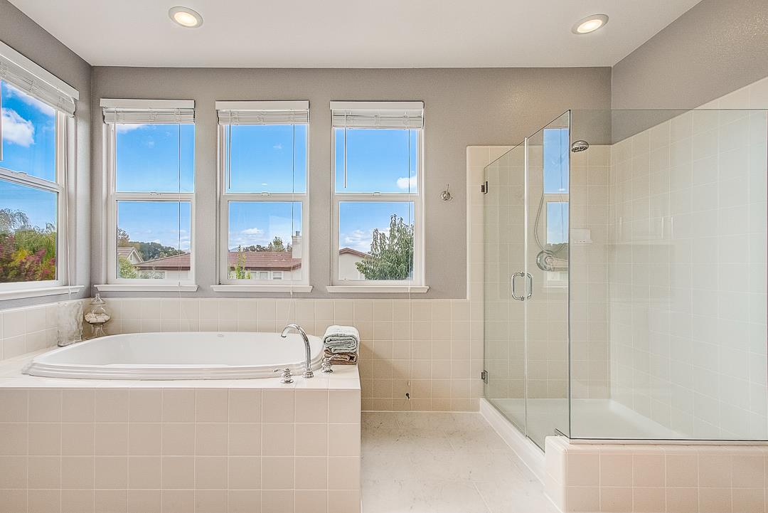 7108 Lahinch Drive Gilroy, CA 95020 - Photo 36 of 50 a bathroom with a bathtub and a shower