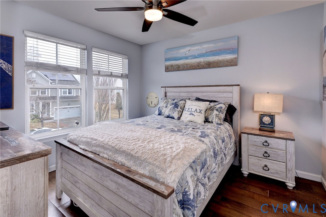 8428 Sheldon Branch Place Toano, VA 23168 - Photo 27 of 46 a bedroom with a bed and a dresser