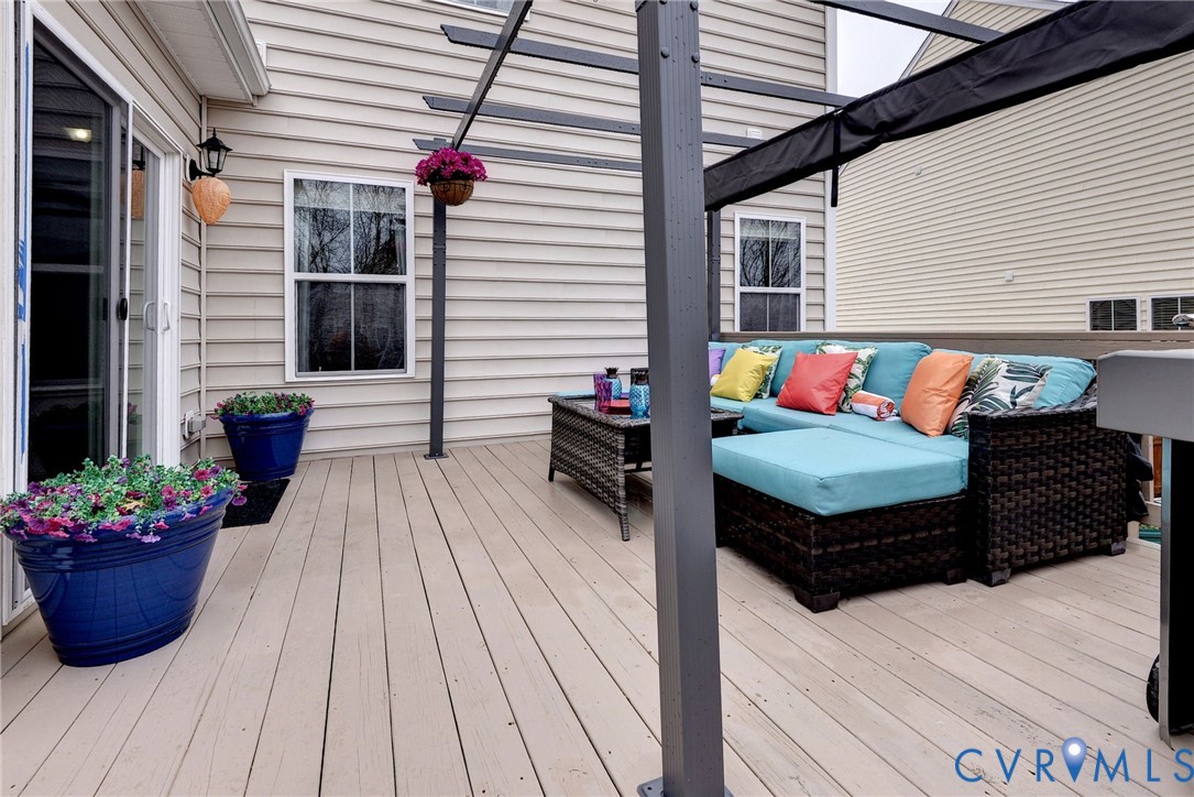 8428 Sheldon Branch Place Toano, VA 23168 - Photo 30 of 46 a view of a two chairs in the balcony