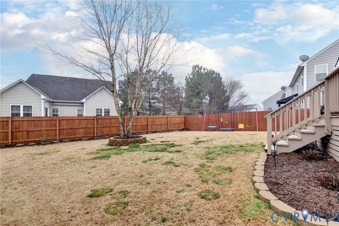 8428 Sheldon Branch Place Toano, VA 23168 - Photo 31 of 46 a backyard of a house