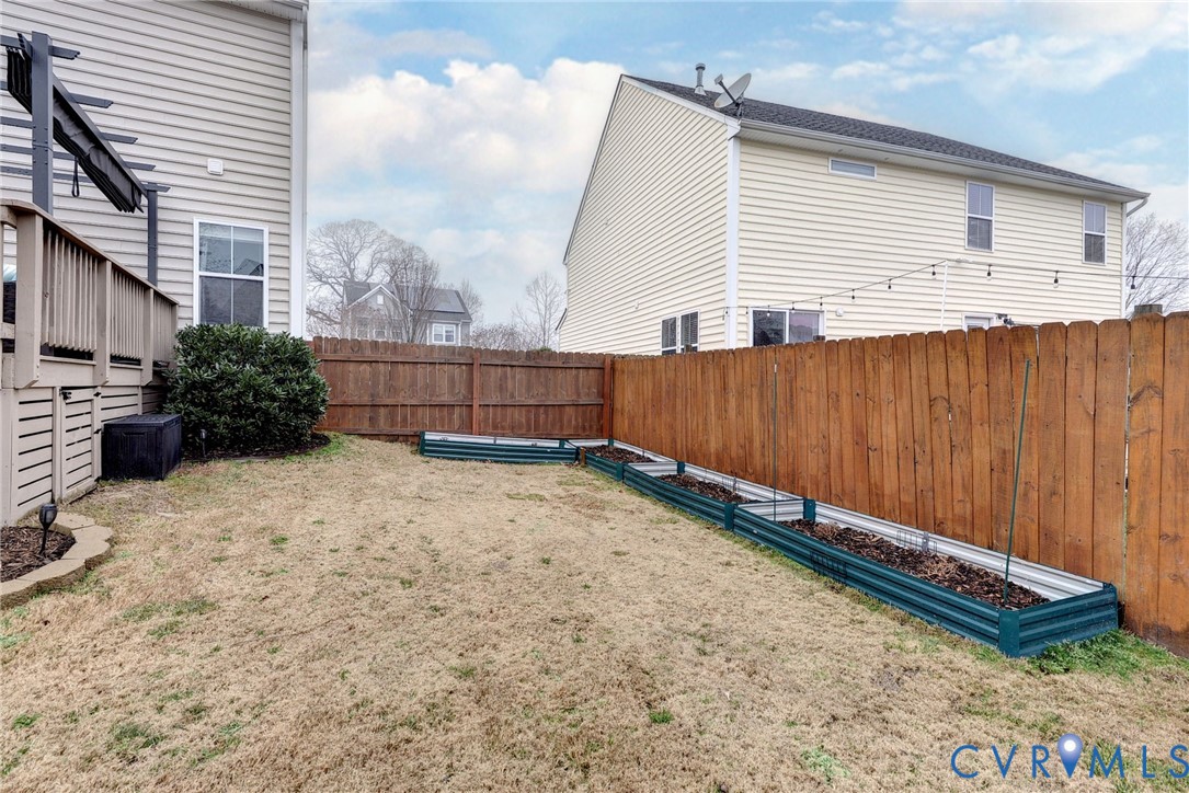 8428 Sheldon Branch Place Toano, VA 23168 - Photo 32 of 46 a backyard of a house
