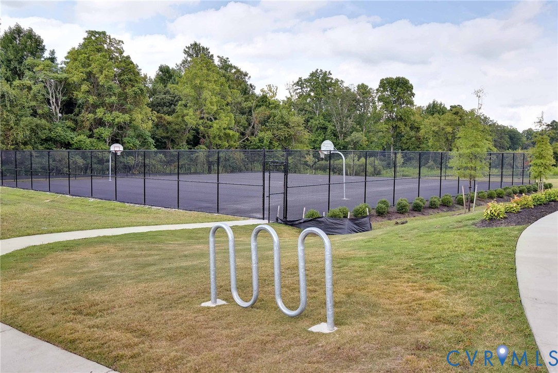 8428 Sheldon Branch Place Toano, VA 23168 - Photo 39 of 46 a view of a swimming pool with chairs