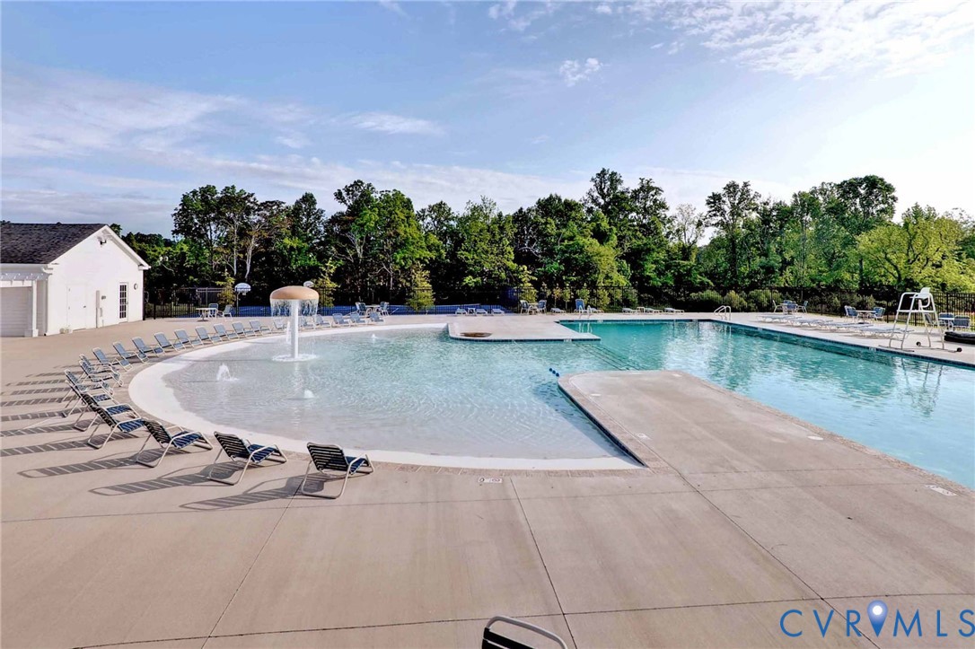 8428 Sheldon Branch Place Toano, VA 23168 - Photo 41 of 46 a view of a swimming pool with a yard