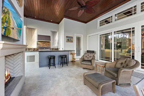 a view of swimming pool with a patio and a yard