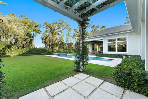 a view of a golf course with a lake