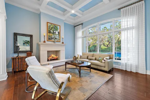 a kitchen with stainless steel appliances granite countertop a stove and a white cabinets