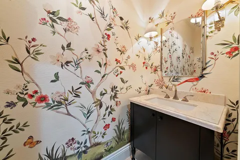 a view of a livingroom with furniture and closet area