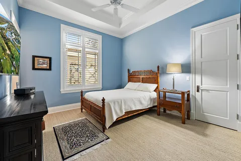an aerial view of residential houses with outdoor space and river