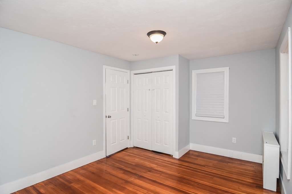 13 Crump Street Hudson, MA 01749 - Photo 11 of 33 a view of an empty room with wooden floor