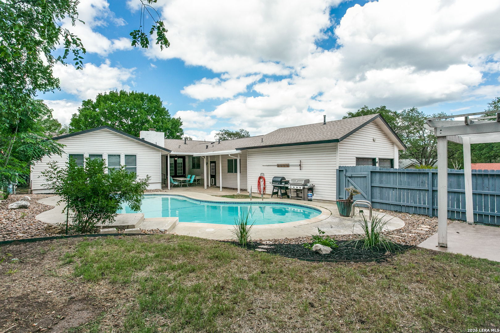 102 Silver Spring Universal City, TX 78148 - Photo 34 of 36 a view of a house with a yard and potted plants