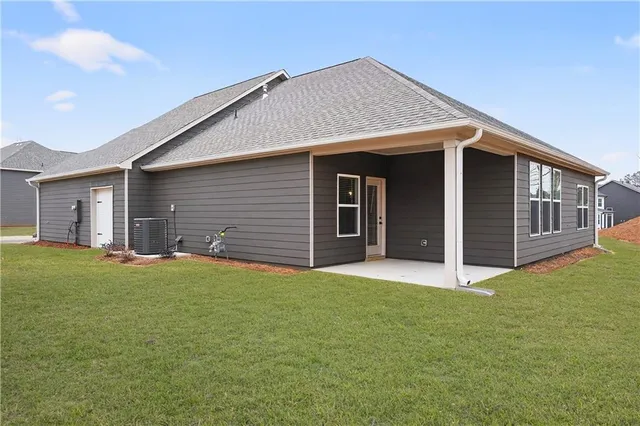 a house view with a backyard space