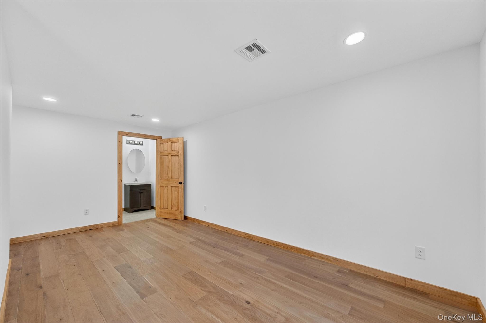 71 Blacks Road Kingston, NY 12401 - Photo 11 of 20 a view of an empty room with wooden floor