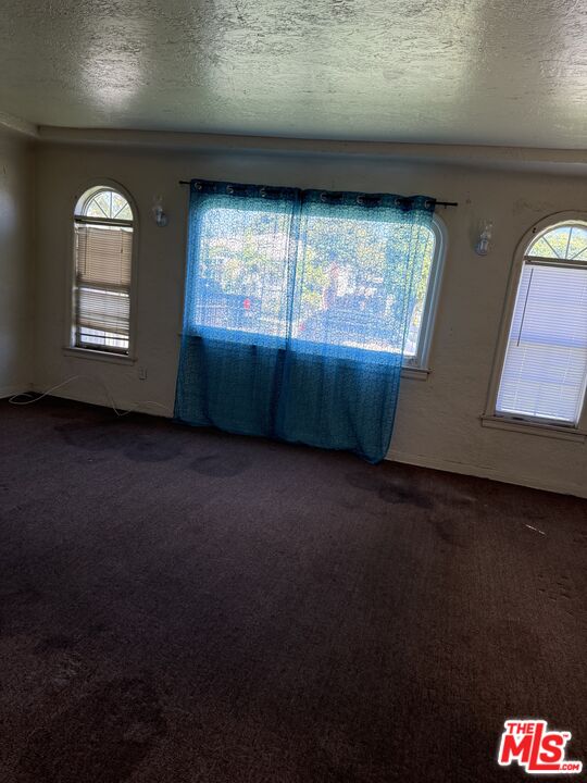 1415 North Spring Avenue Compton, CA 90221 - Photo 21 of 24 an empty room with windows