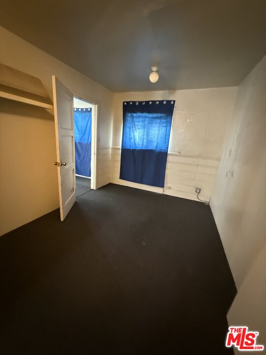 1415 North Spring Avenue Compton, CA 90221 - Photo 4 of 24 a view of an empty room with closet