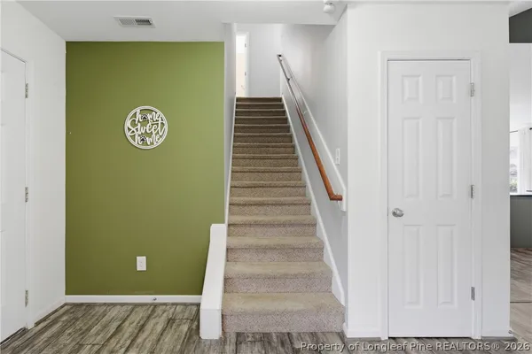 a view of entryway with stairs