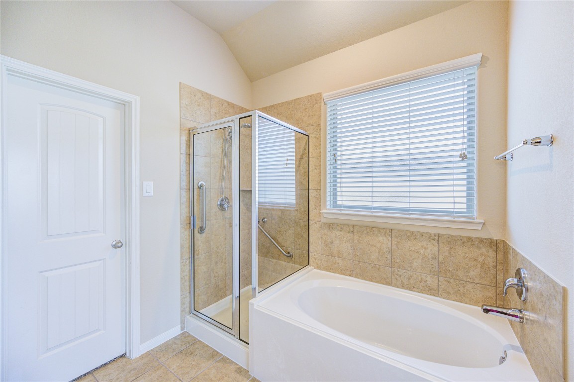 19306 Boulder Bay Lane Humble, TX 77346 - Photo 26 of 46 a white bath tub sitting next to a shower