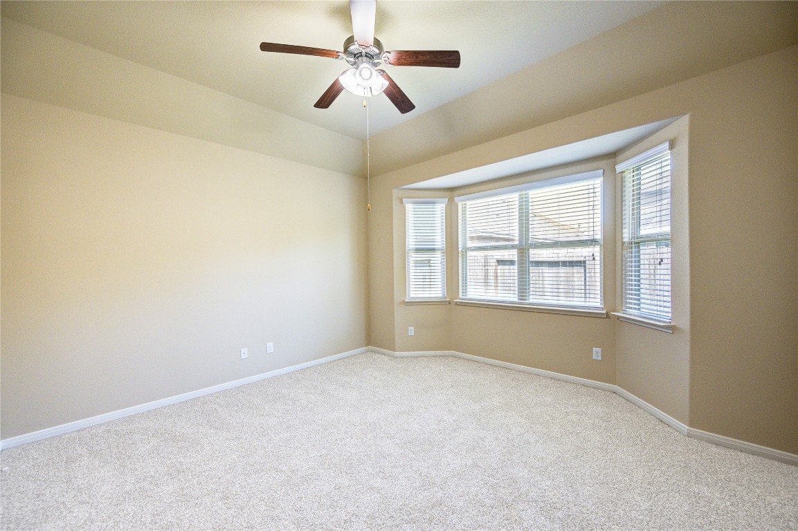 19306 Boulder Bay Lane Humble, TX 77346 - Photo 30 of 46 a view of an empty room with a window