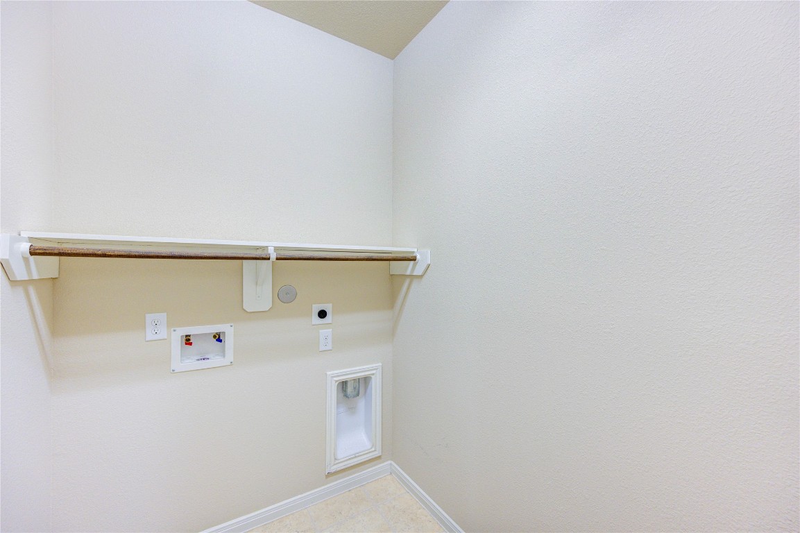 19306 Boulder Bay Lane Humble, TX 77346 - Photo 34 of 46 a utility room with dryer and washer
