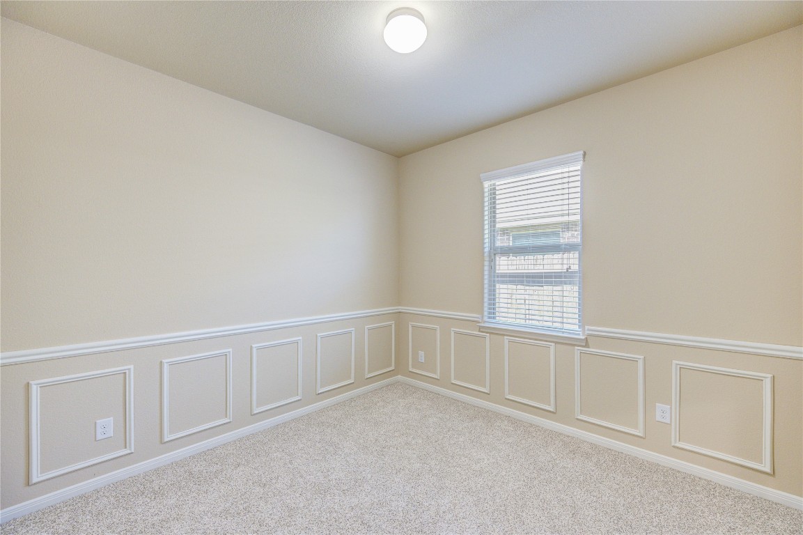 19306 Boulder Bay Lane Humble, TX 77346 - Photo 37 of 46 an empty room with windows