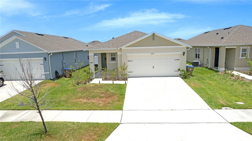 1807 Wild Rye Way Kissimmee, FL 34744 - Photo 1 of 1 a view of backyard of the house