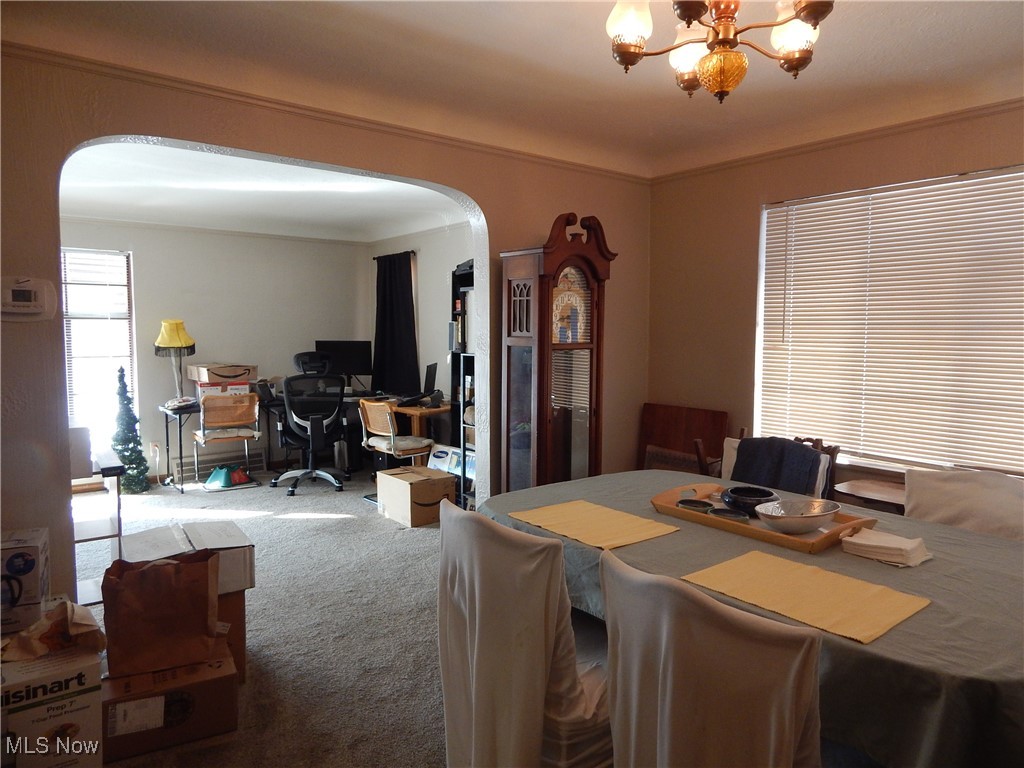 3685 Warren Road Cleveland, OH 44111 - Photo 14 of 26 Carpeted dining space overlooks spacious Living Room.