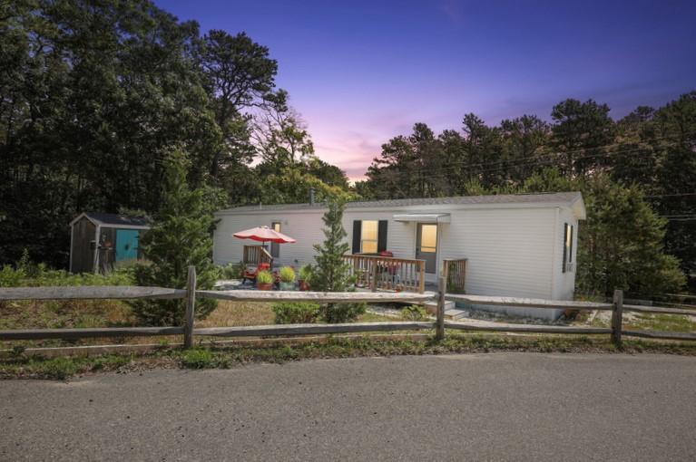 210 W Road, Unit A12 Wellfleet, MA 02667 - Photo 17 of 18 010-photo-twilight-front-view-8429619