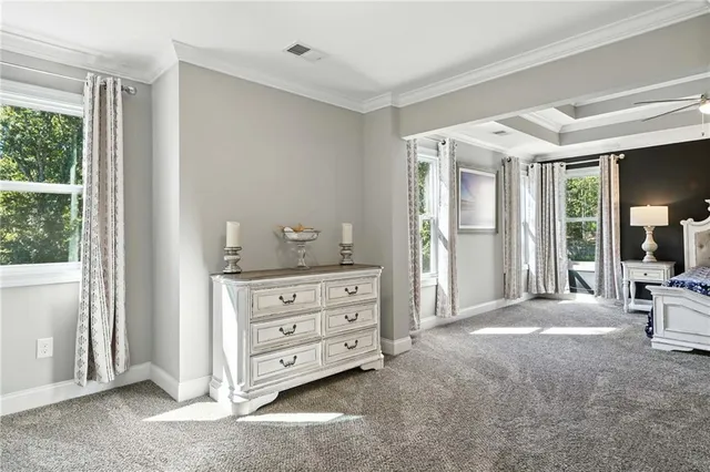 a view of room with furniture and windows