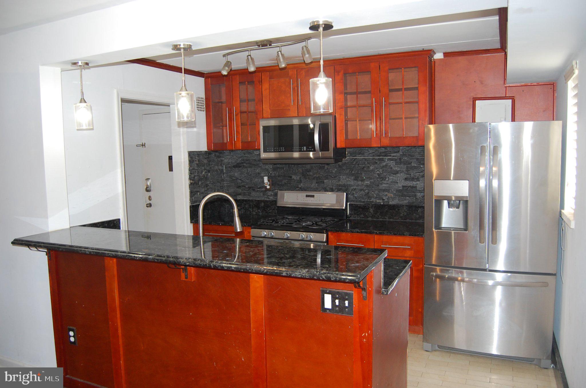 Modern kitchen with sleek finishes.