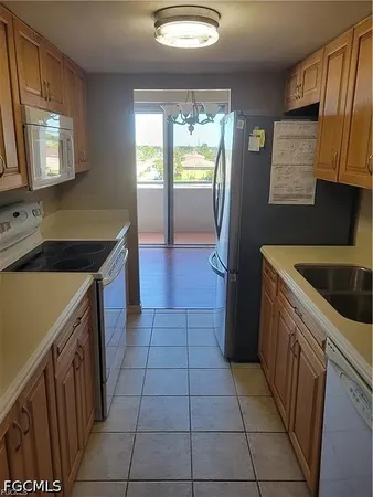 $1,600 | 4803 Sunset Court, Unit 402, Cape Coral, FL 33904