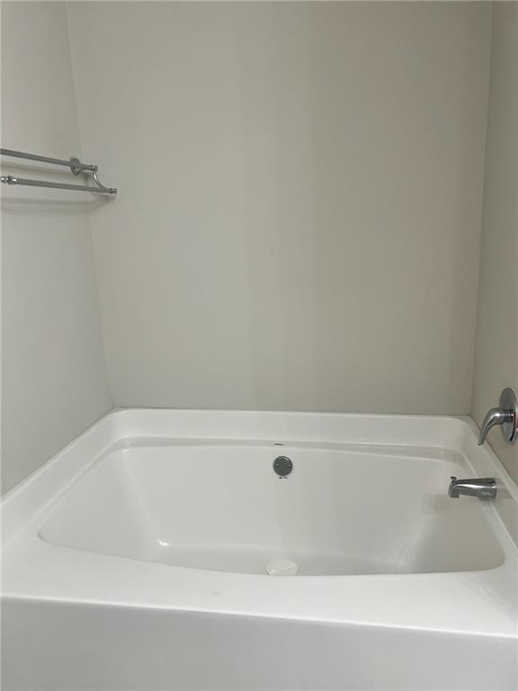 7150 Fringe Flower Drive, Unit 20 Austell, GA 30168 - Photo 11 of 41 a bathroom with a bathtub