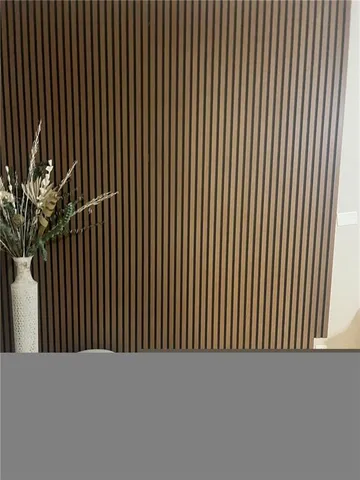 a view of a black space with a chair