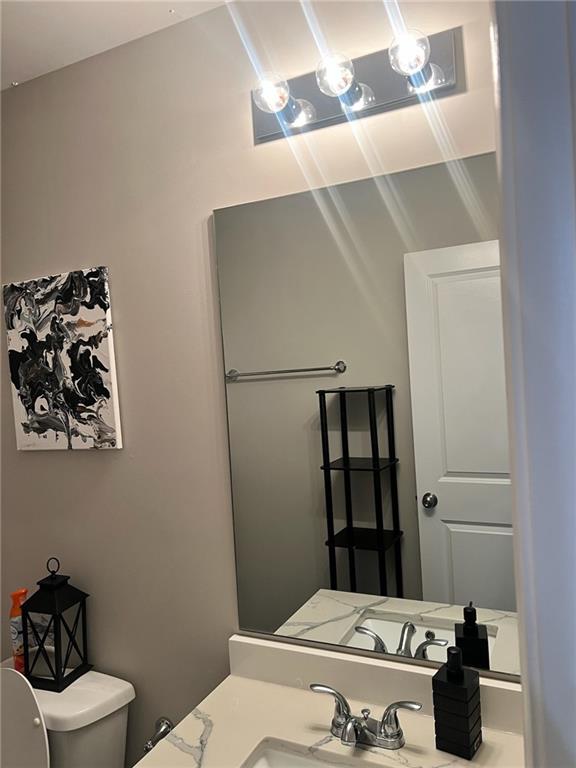 7150 Fringe Flower Drive, Unit 20 Austell, GA 30168 - Photo 18 of 41 a bathroom with a sink and toilet