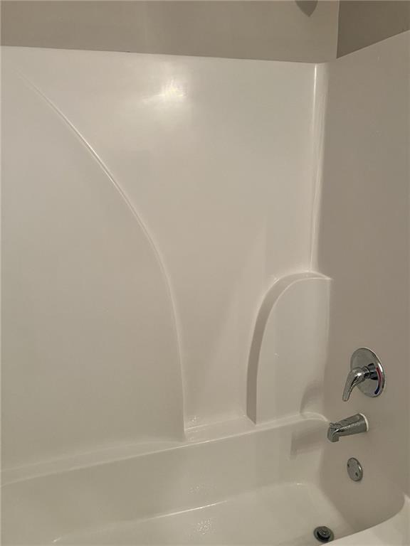 7150 Fringe Flower Drive, Unit 20 Austell, GA 30168 - Photo 19 of 41 a bathroom with a bathtub