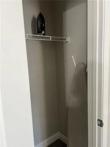 a close view of a closet in the wall