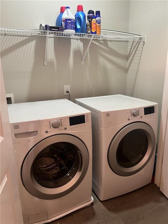 7150 Fringe Flower Drive, Unit 20 Austell, GA 30168 - Photo 32 of 41 a utility room with dryer and washer
