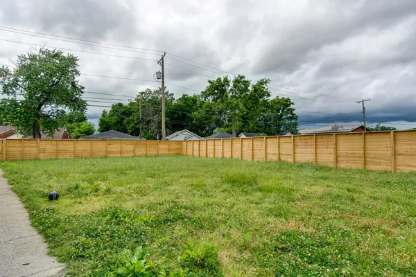 a view of a yard in front of a house