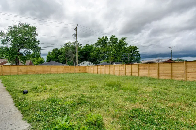 a view of a yard in front of a house