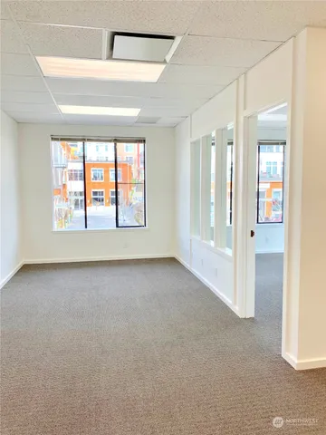 an empty room that has a window