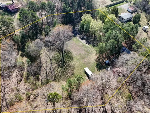 a view of a house in a forest