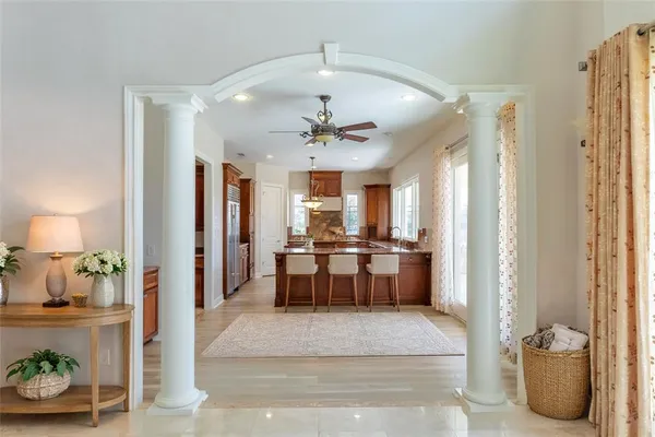 a view of a living room and chandelier