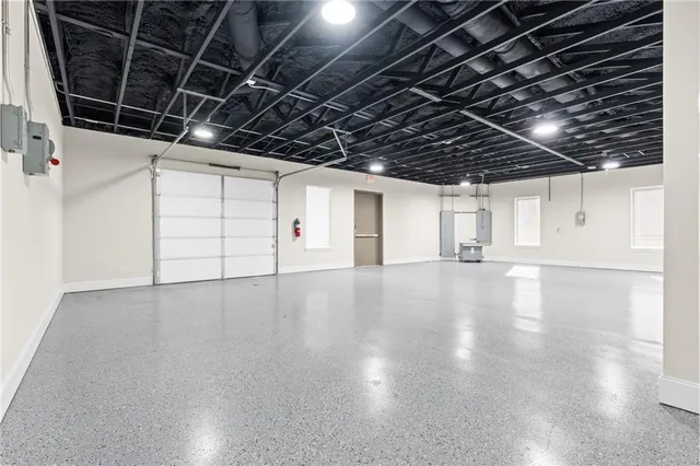 a view of a room with wooden walls and roof