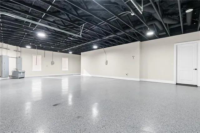 a view of a room with wooden walls