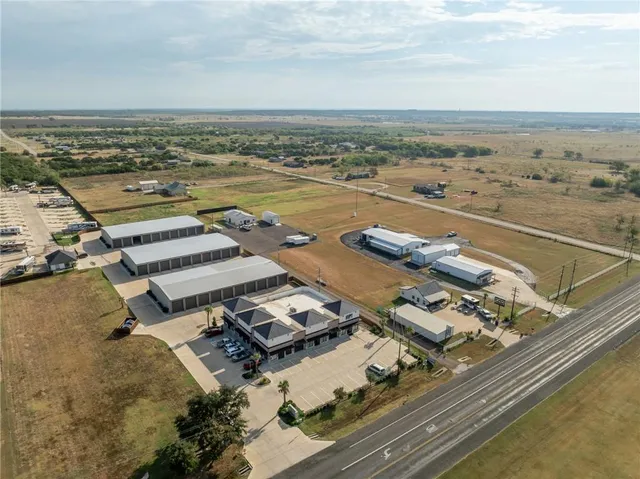 a view of a house with a barbeque
