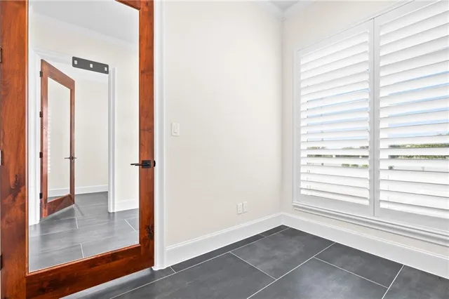 a view of a room that has a window in it