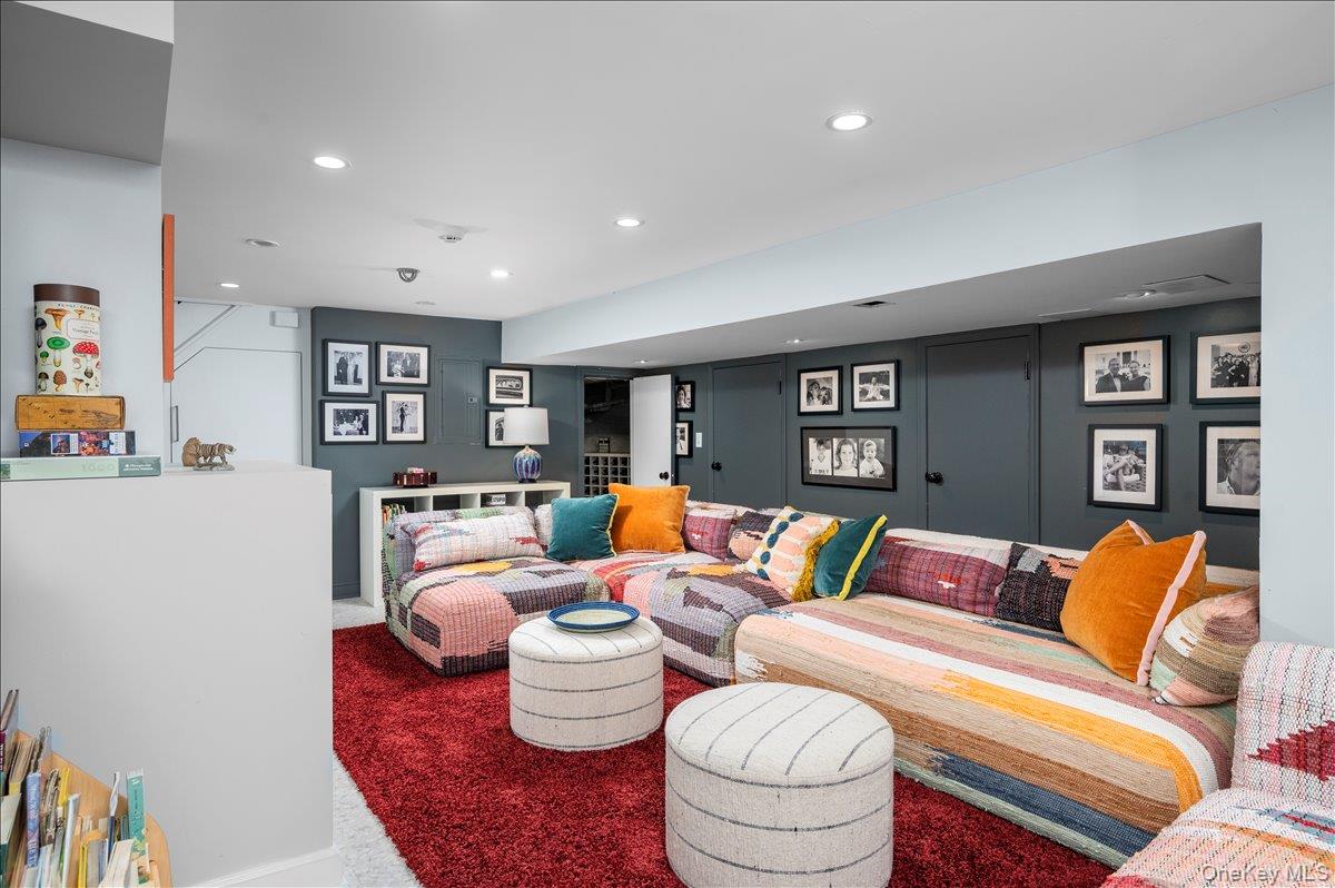 18 South Ridge Road Larchmont, NY 10538 - Photo 23 of 35 a living room with furniture and painting on the wall