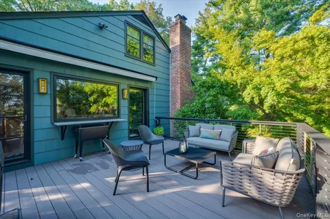 a outdoor living space with furniture and garden view